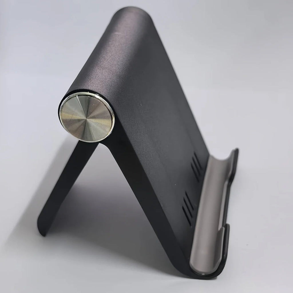 Portable Foldable Phone Stand, Adjustable Angle, Durable Plastic, Universal for Smartphones , Compact Modern Design.