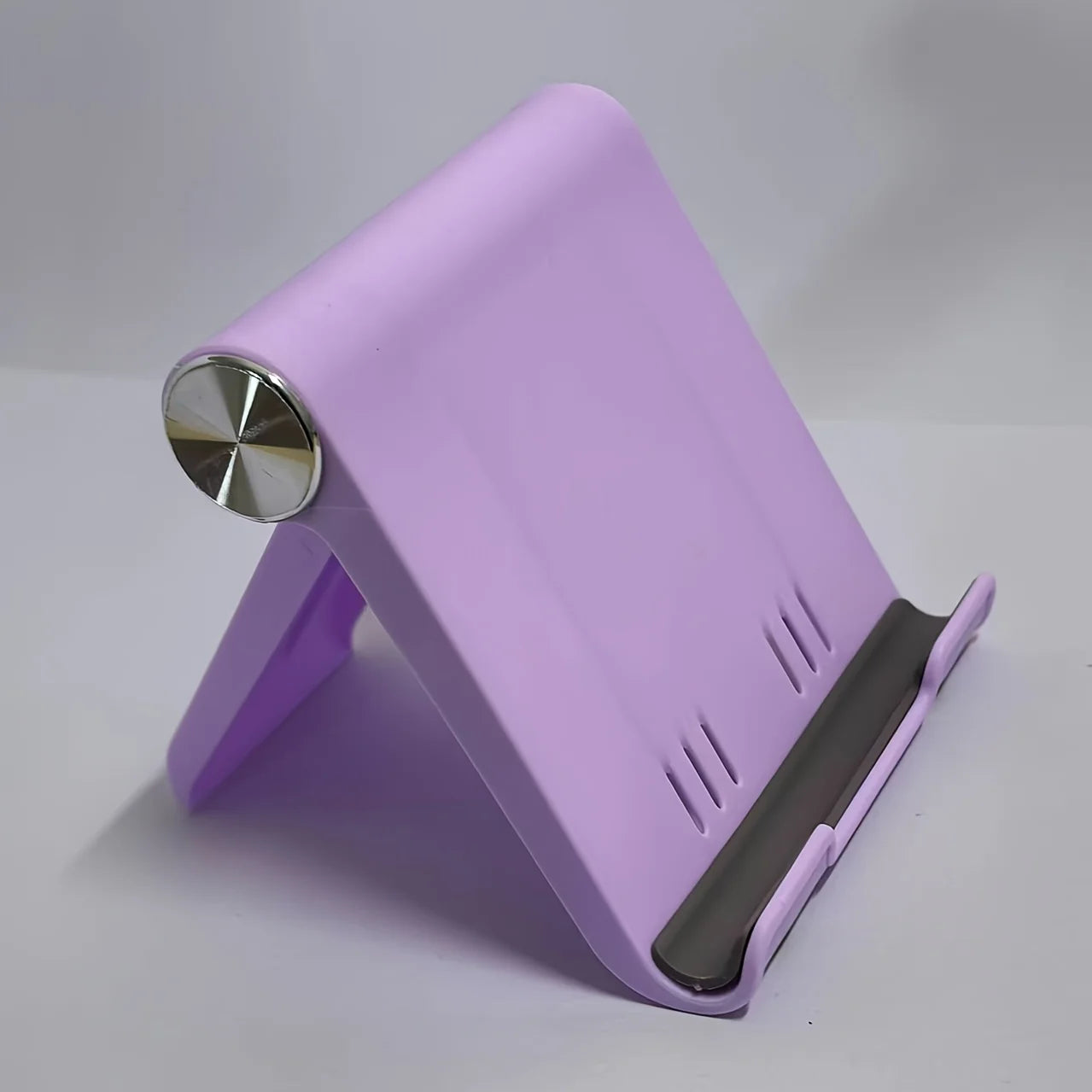 Portable Foldable Phone Stand, Adjustable Angle, Durable Plastic, Universal for Smartphones , Compact Modern Design.
